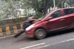 यातायात पुलिसकर्मी को कार चालक ने 500 मीटर तक बोनट पर घसीटा,मामला दर्ज